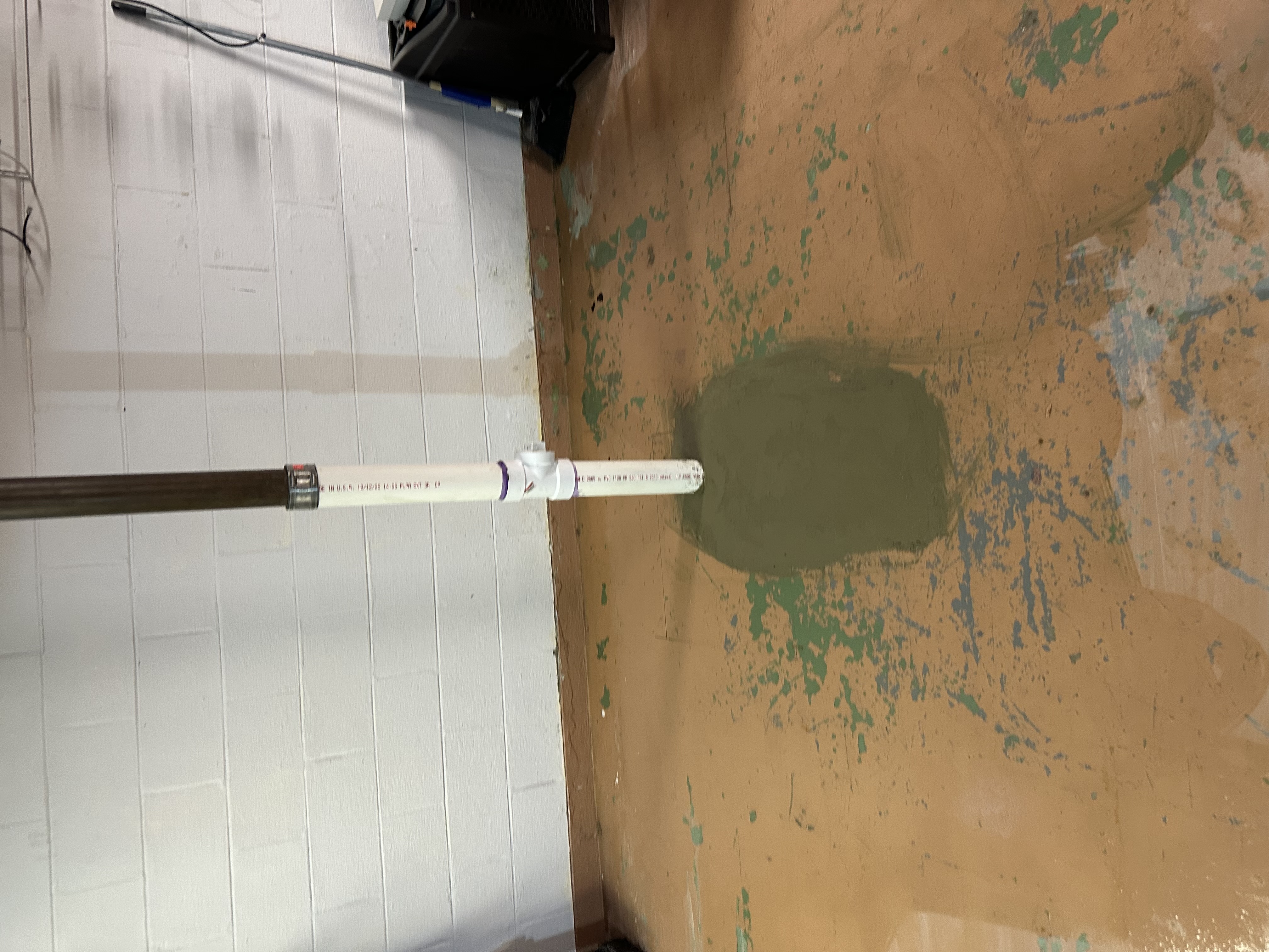 New PVC basement drain pipe installed by Gray's Precision Plumbing - Northeast Ohio