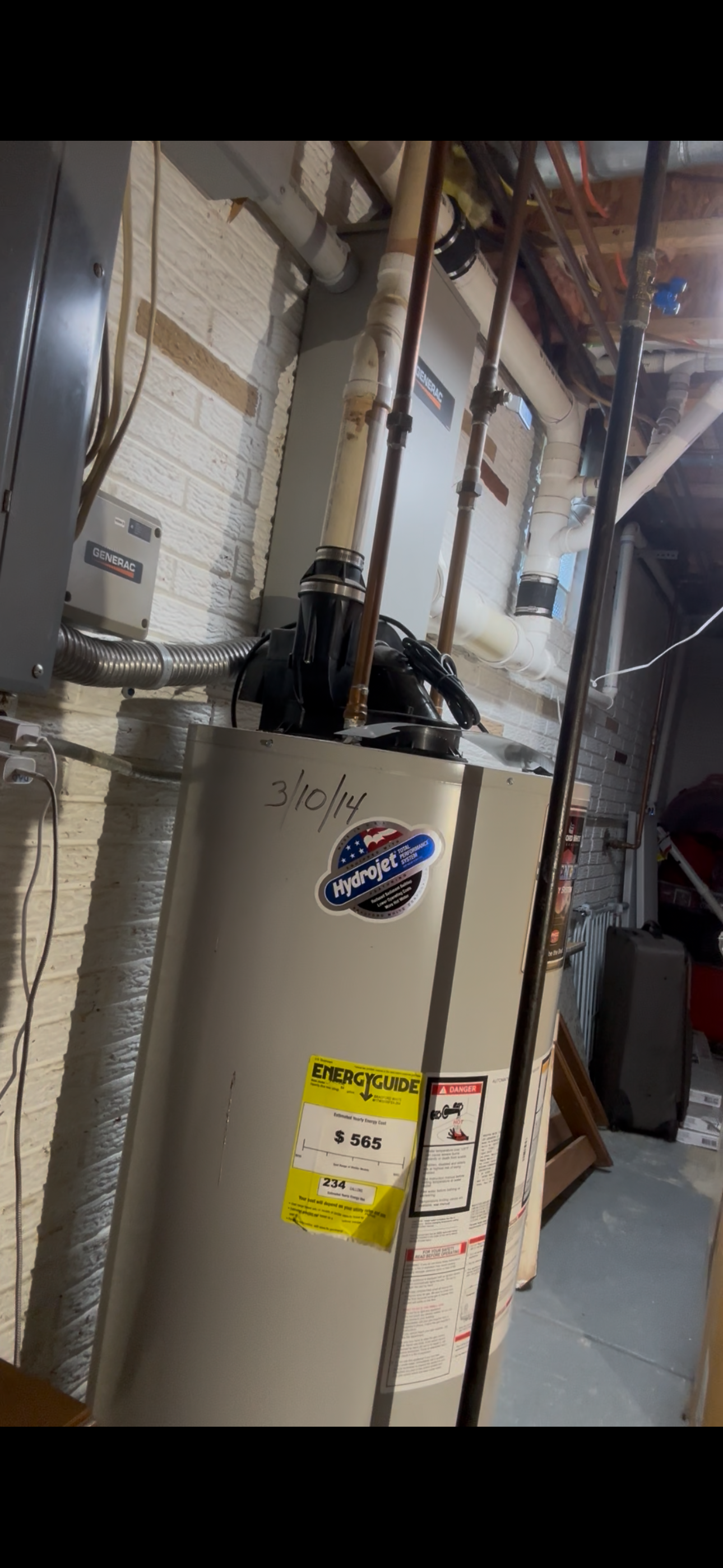 Old tank water heater installed 2014 before tankless upgrade - Northeast Ohio plumber