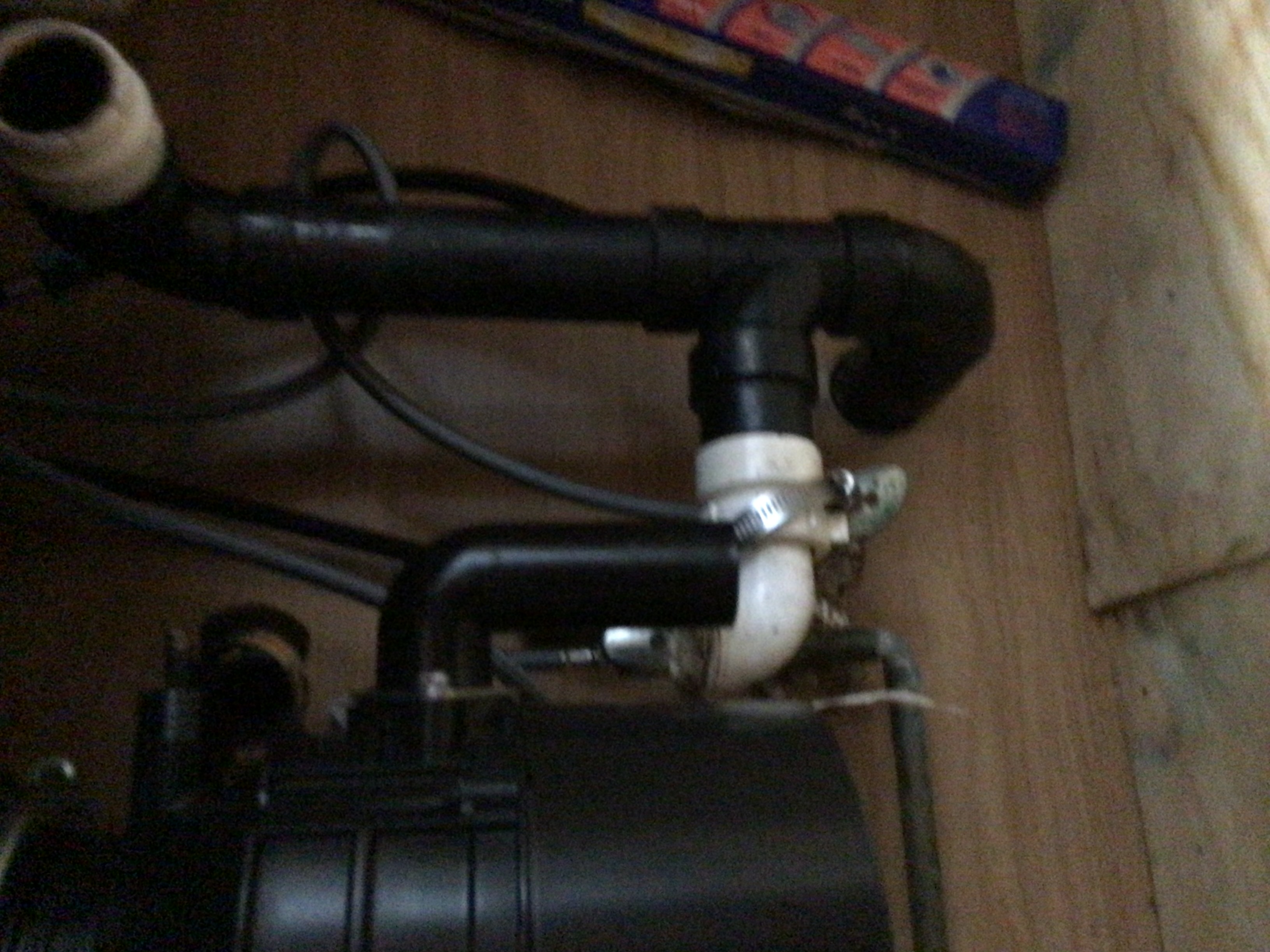 Leaking under-sink drain with mismatched pipes before repair - Northeast Ohio plumber